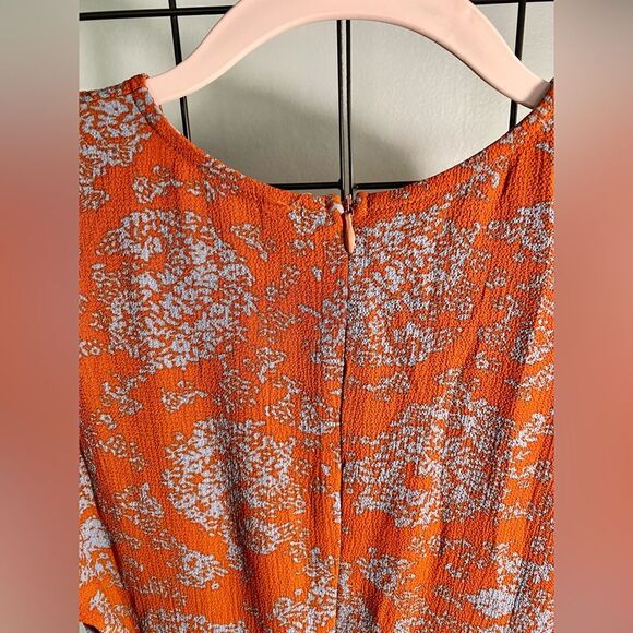 Unbranded women’s floral long sleeve rust colored romper NWOT - Picture 5 of 10
